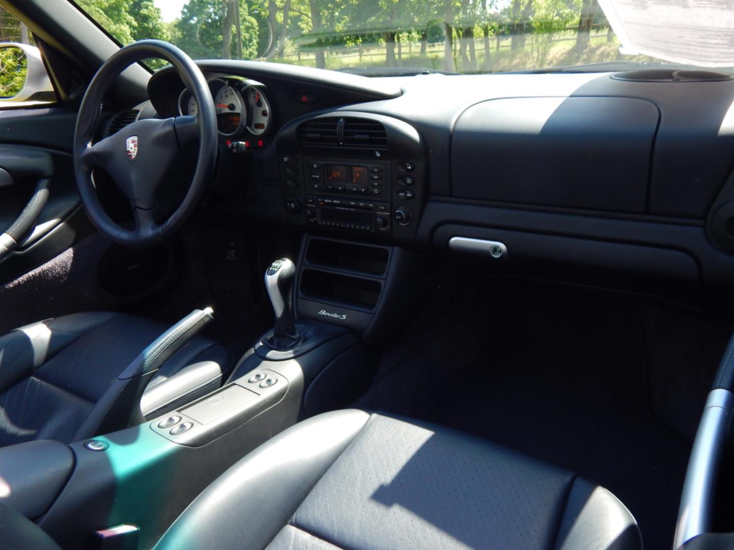 2003 Silver /Blue Leather Porsche Boxster S (WP0CB29873U) with an 3.2L H6 DOHC 24V engine, 6 speed manual transmission, located at 6528 Lower York Road, New Hope, PA, 18938, (215) 862-9555, 40.358707, -74.977882 - Here we have a beautiful Porsche Boxster S with only 18,200 miles that is in pristine condition. This Porsche runs and drives like it did when it was brand new. Options on this beautiful convertible include: 3.2L 6 cylinder engine, rear wheel drive, 6 speed manual transmission, blue leather, 2 mast - Photo#20